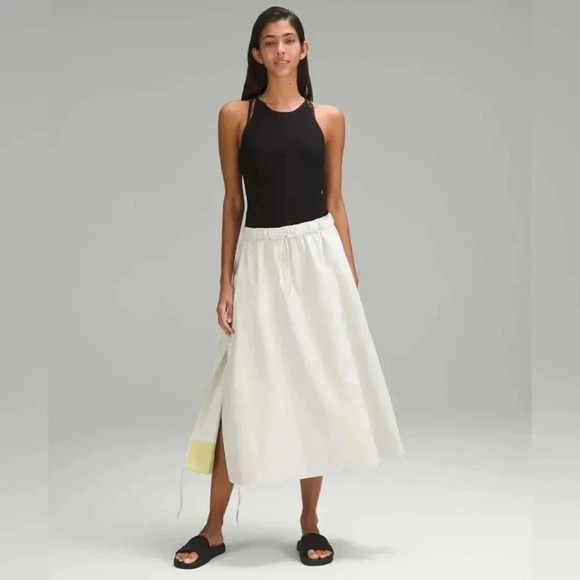 lululemon athletica Dresses & Skirts - NWTs Lululemon High Low Side Slit SHR Skirt Size M